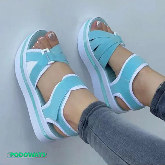 Sandales orthopédiques à mémoire de forme, coloris bleu, s'adaptent à la forme unique de chaque pied.