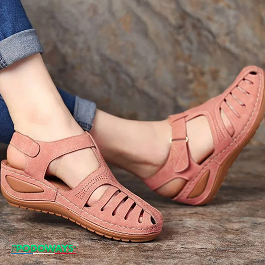 Sandales orthopédiques élégantes à semelles compensées pour femmes coloris rose vue de côté